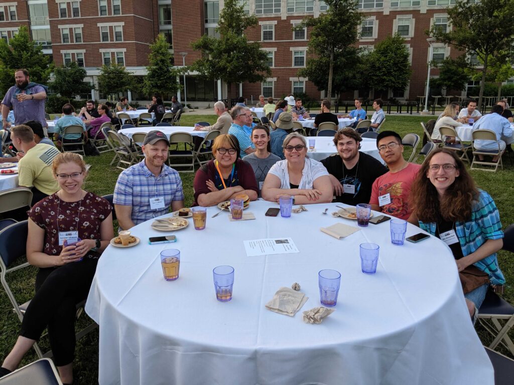 Group photo at the ISMS 2019 picnic. Left to right: Sommer Johansen, Kyle Crabtree, Hannah Toru, Haley Scolati, Kelly Meyer, Zach Buchanan, Zhongxing Xu, Wes Westerfield