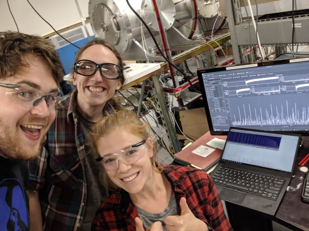 Zach Buchanan, Wes Westerfield, and Sommer Johansen with one of our earliest CP-FTMW spectra displayed